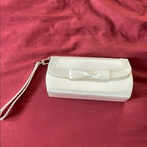 Formal clutch/wristlet